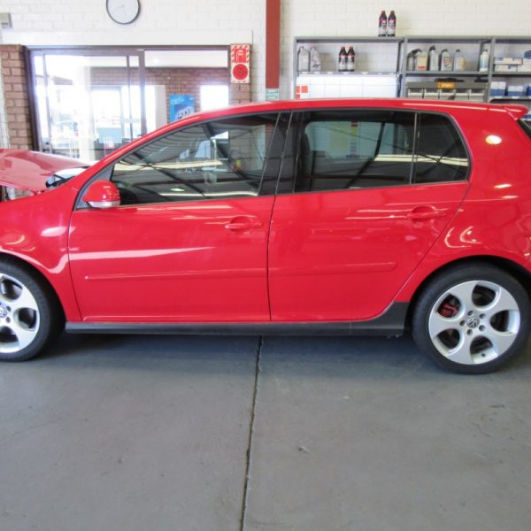 A red Volkswagen Golf GTI MK5 2008 car being wrecked