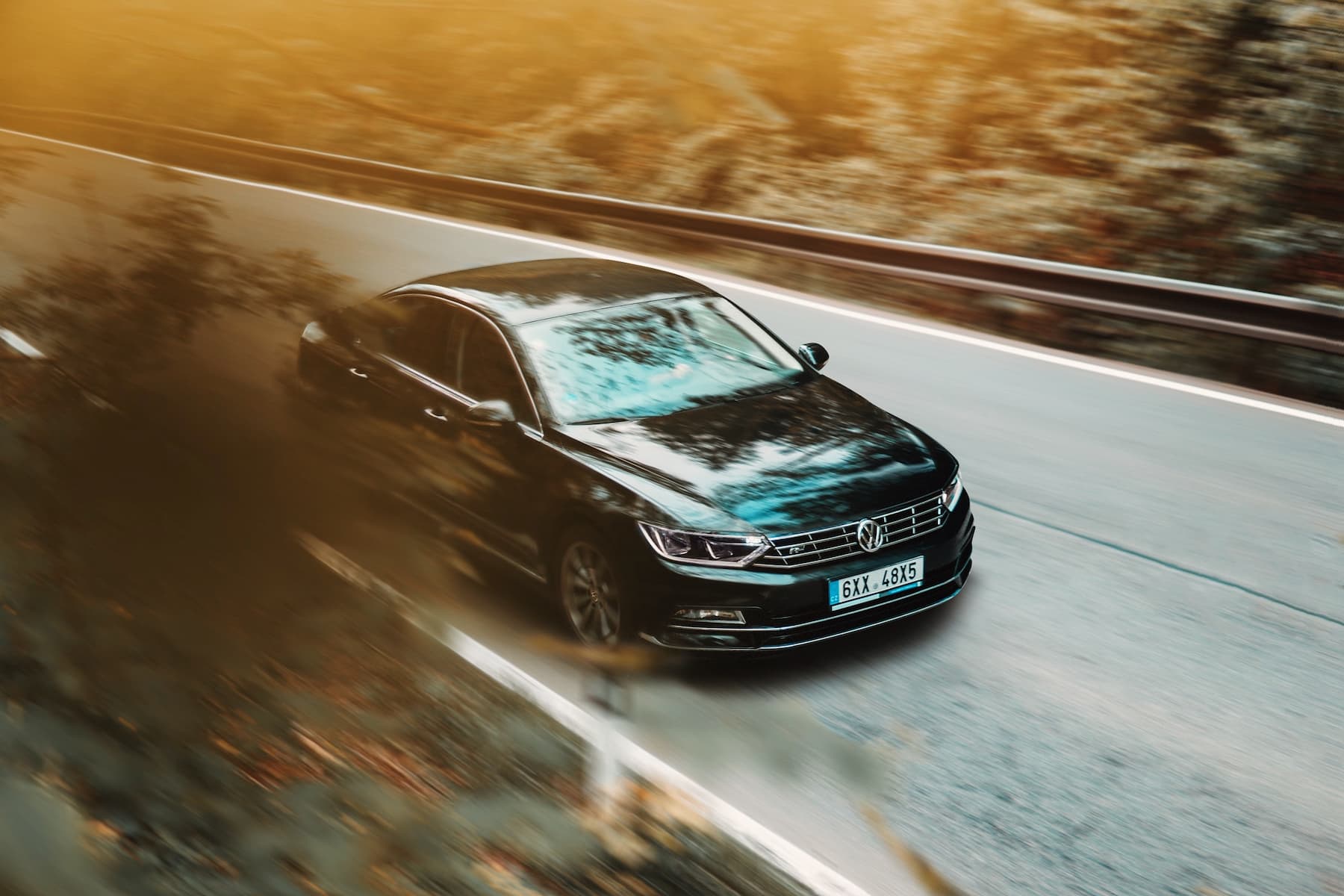 volkswagen driving on road