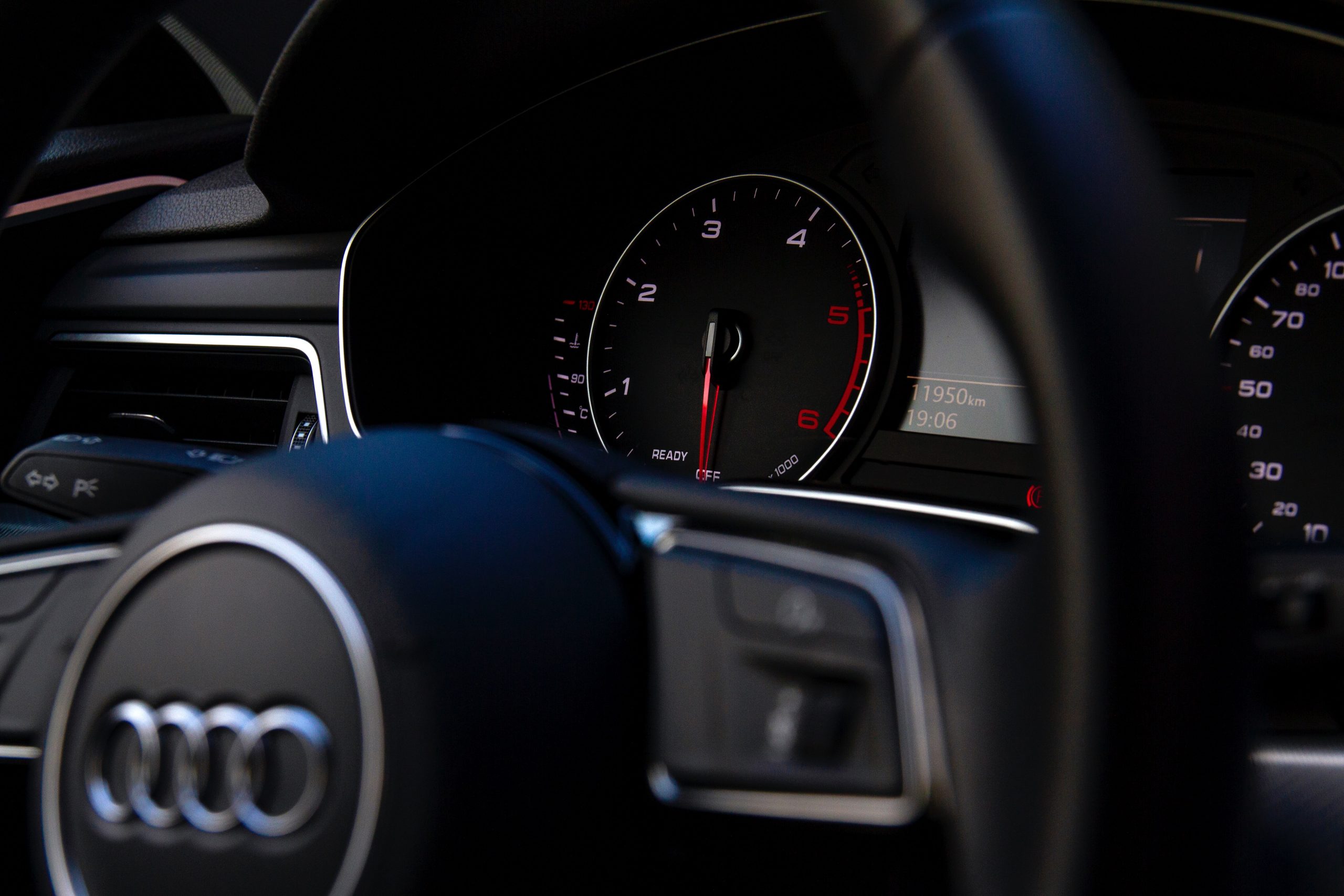 audi car steering wheel and speed gauge